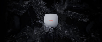 LeaksProtect Jeweller rilevatore allagamenti wireless bianco con acqua nello sfondo